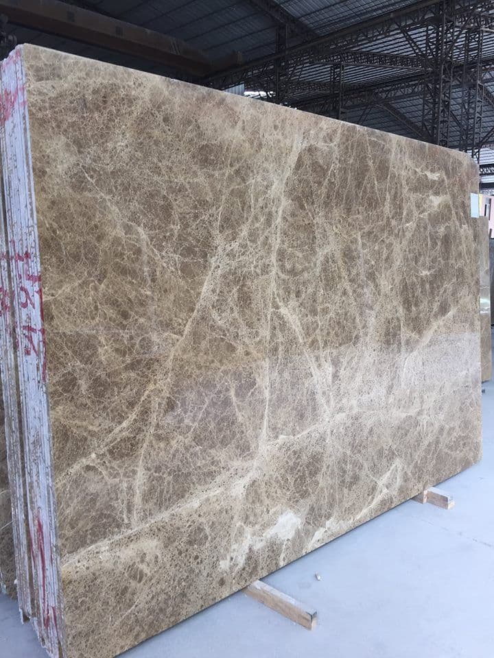 Warm beige marble surface with rich natural texture